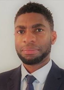 Black gentleman with short brown hair and beard