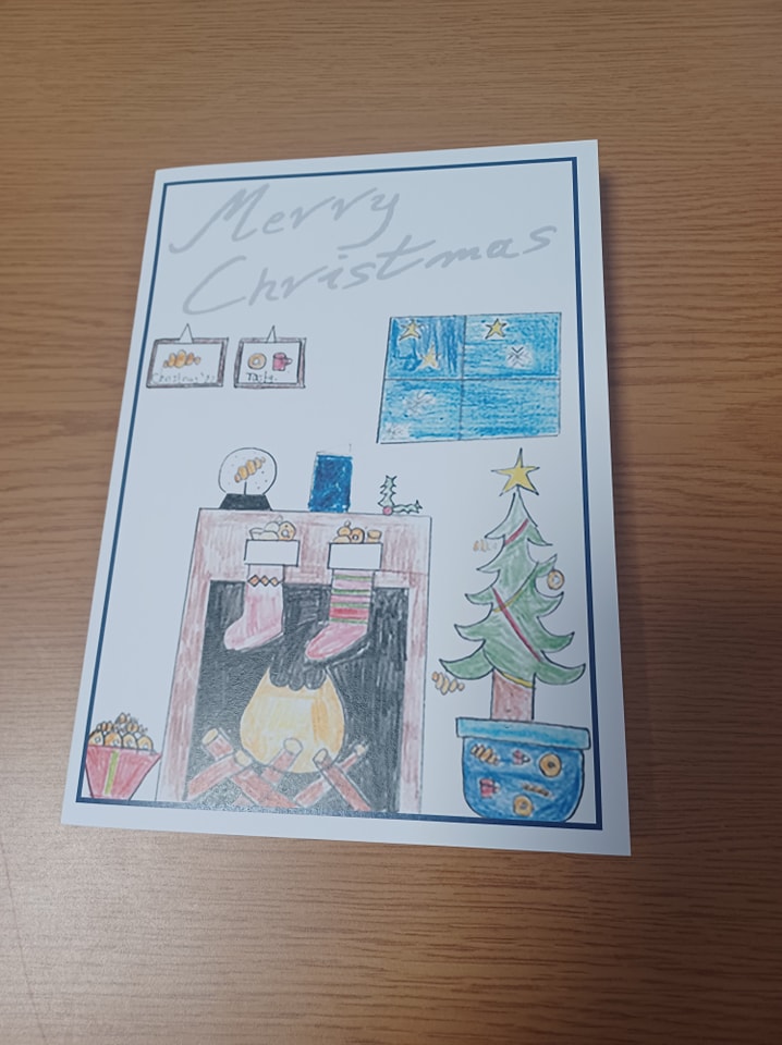 A photo of a Christmas Card designed by a Snowfields Academy student.