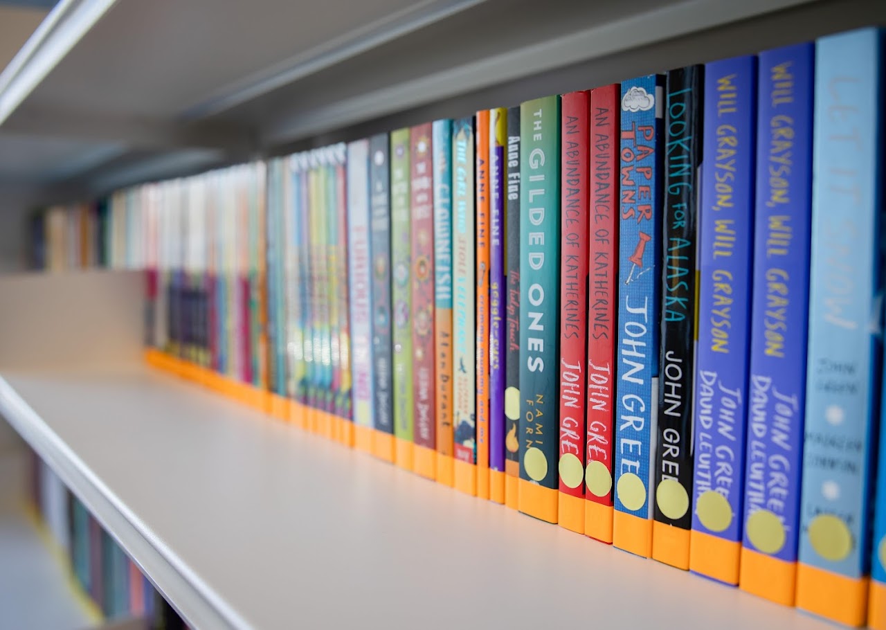 A row of books on a shelf